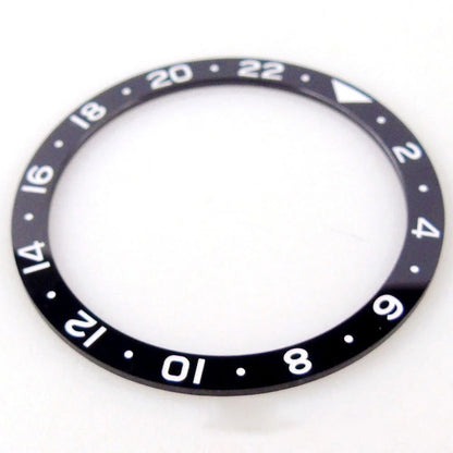 Black 38x31.5mm ceramic GMT bezel insert for SKX NH34 wristwatch, durable watchmaker part.