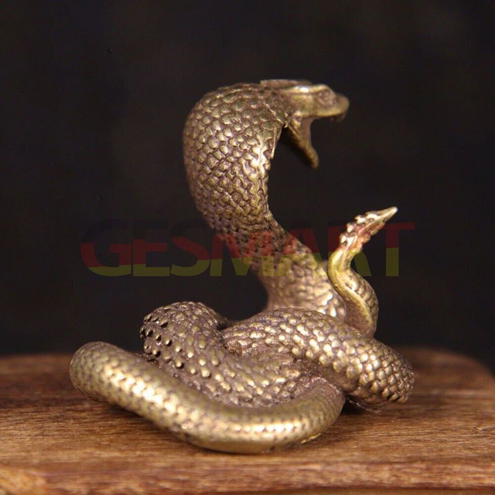 Hand-carved solid copper cobra figurine with bronze finish, detailed collectible trinket for watch accessory display.