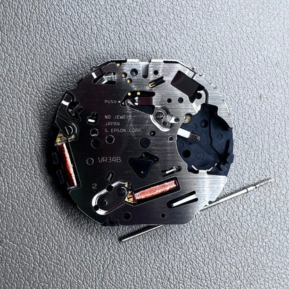 Japan Hattori Epson TMI VR34 quartz watch movement for precise timekeeping in accessories.