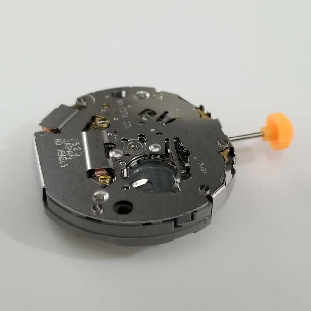 Miyota JS20 quartz watch repair part highlighting precise movement components for accurate timekeeping.