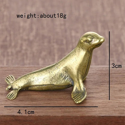 Solid copper vintage seal figurine, hand-carved details, collectible trinket for decoration.