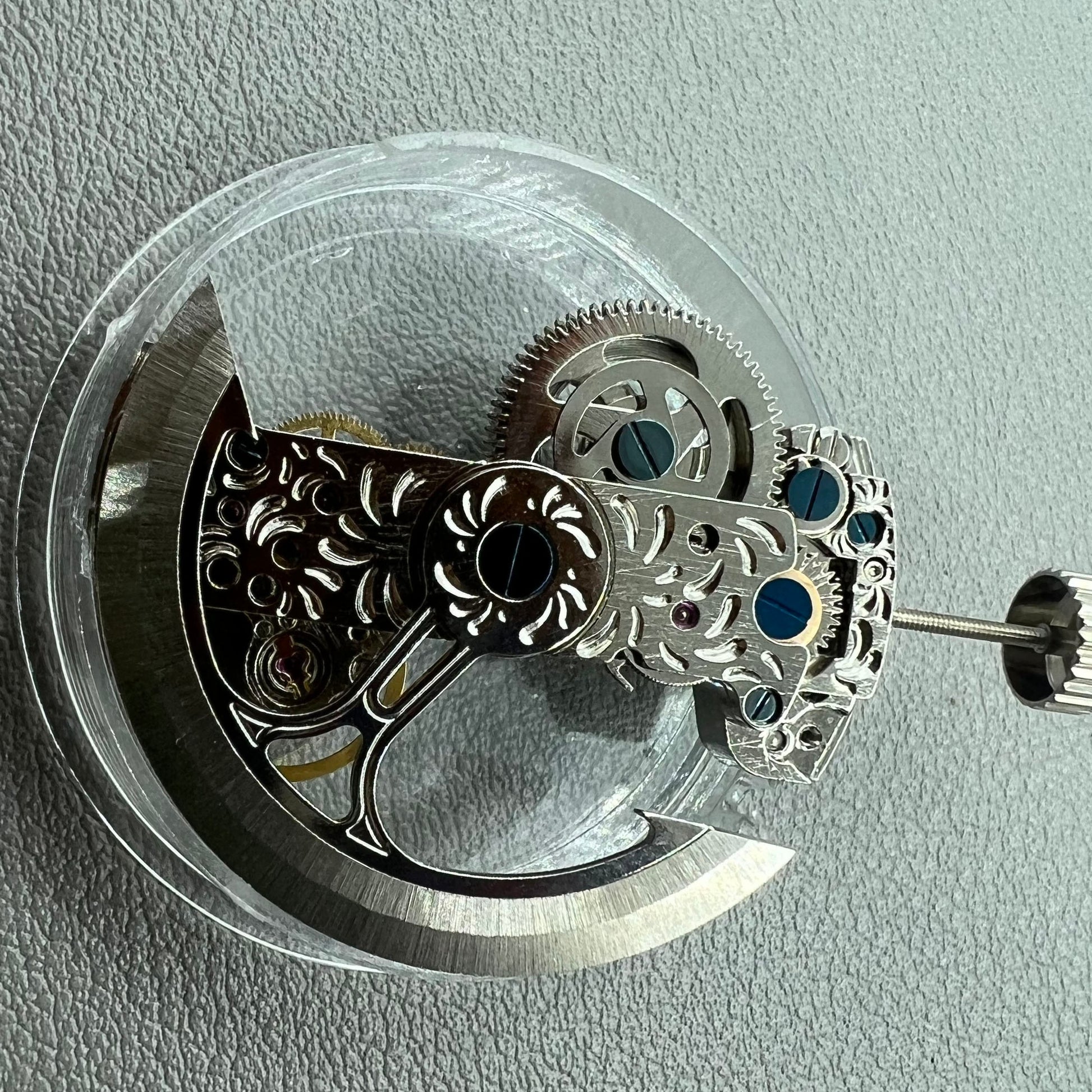 LG0801BS silver long pendulum watch wheel showcasing automatic mechanical movement and sleek design.