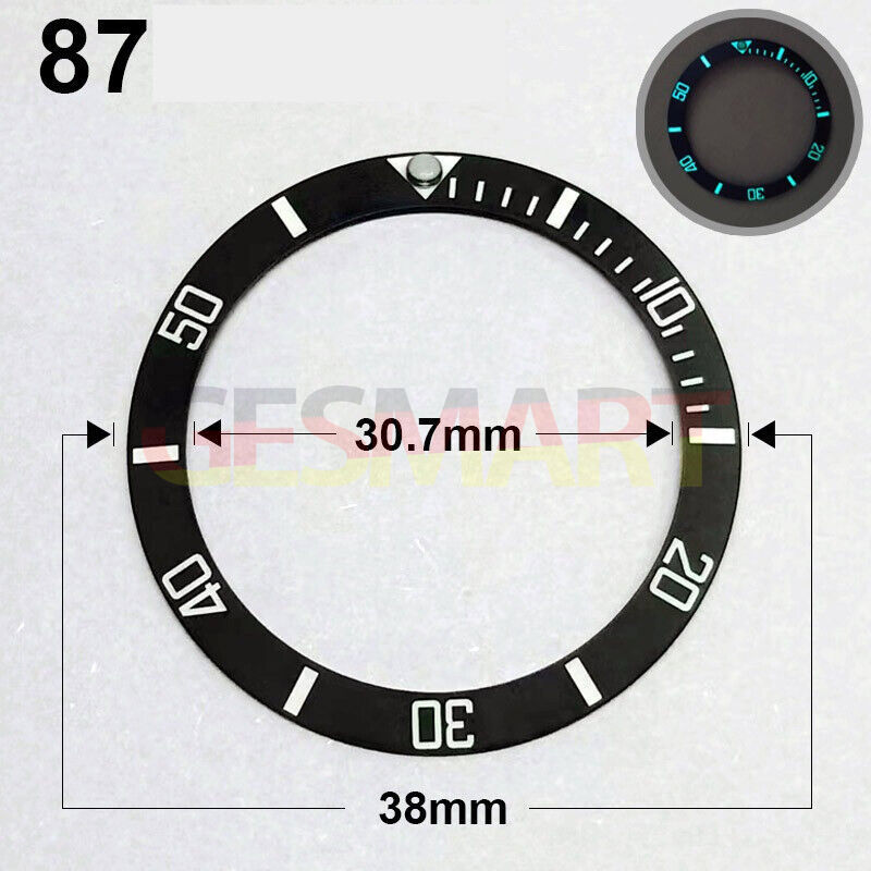 38mm black ceramic watch bezel by Slope, silver font with blue luminous markers for precision timing