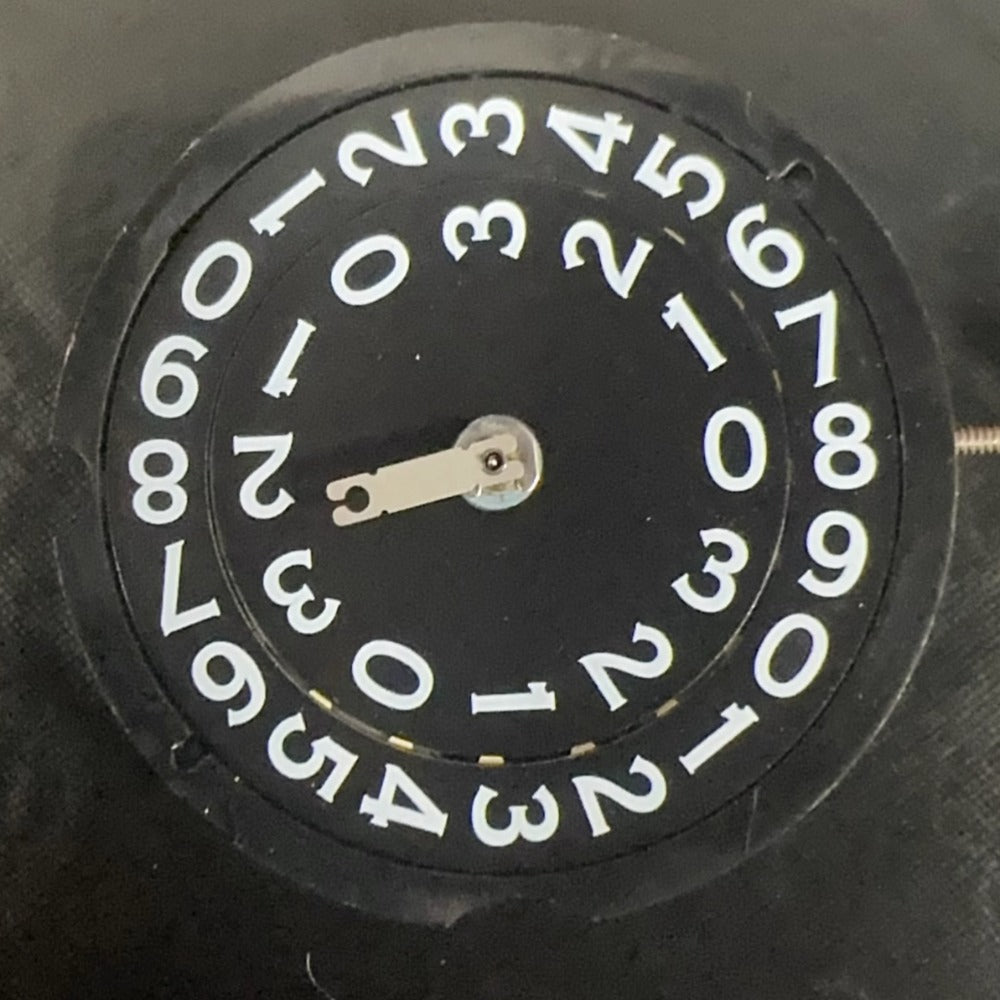 Swiss Made Ronda 509 quartz movement black disk watch part for precise timekeeping accessories.