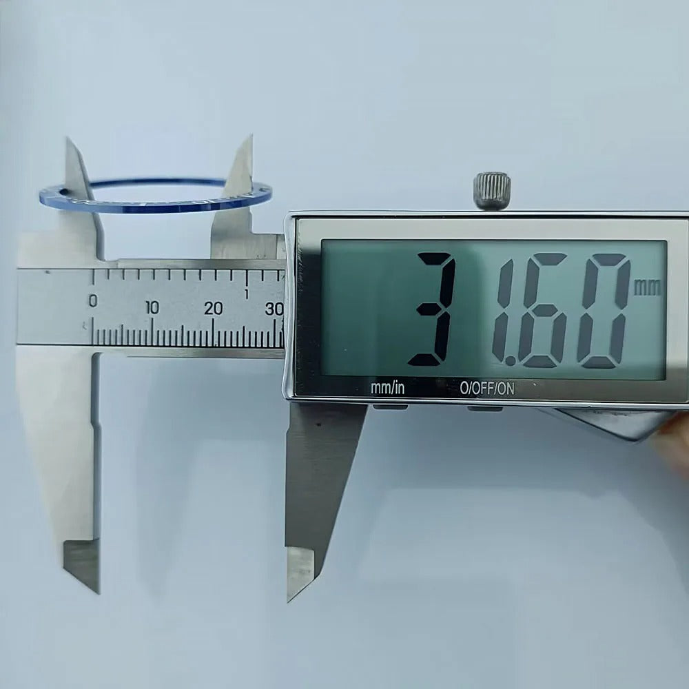 Flat ceramic bezel insert 38mm with luminous markers for precise watch accessory replacement.