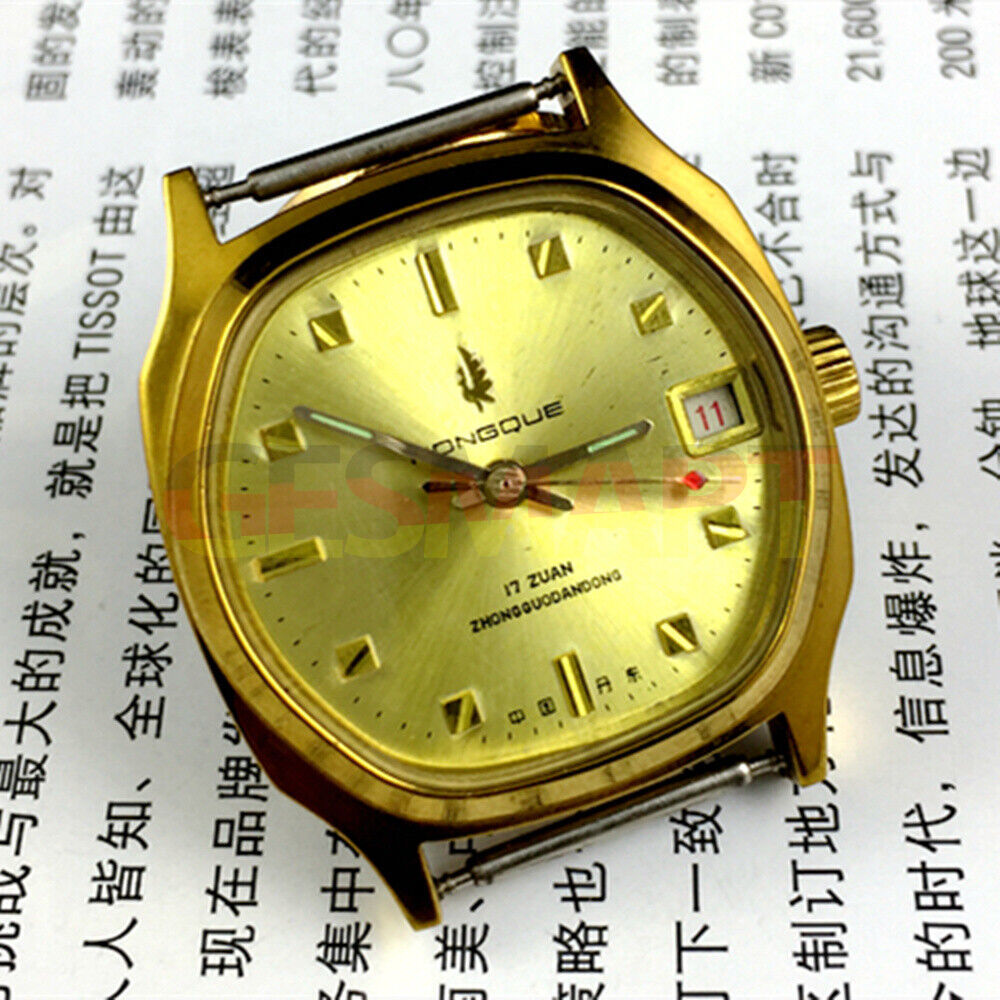 Old Stock Dandong manual mechanical watch with 17 jewels, single calendar, and elegant golden dial.