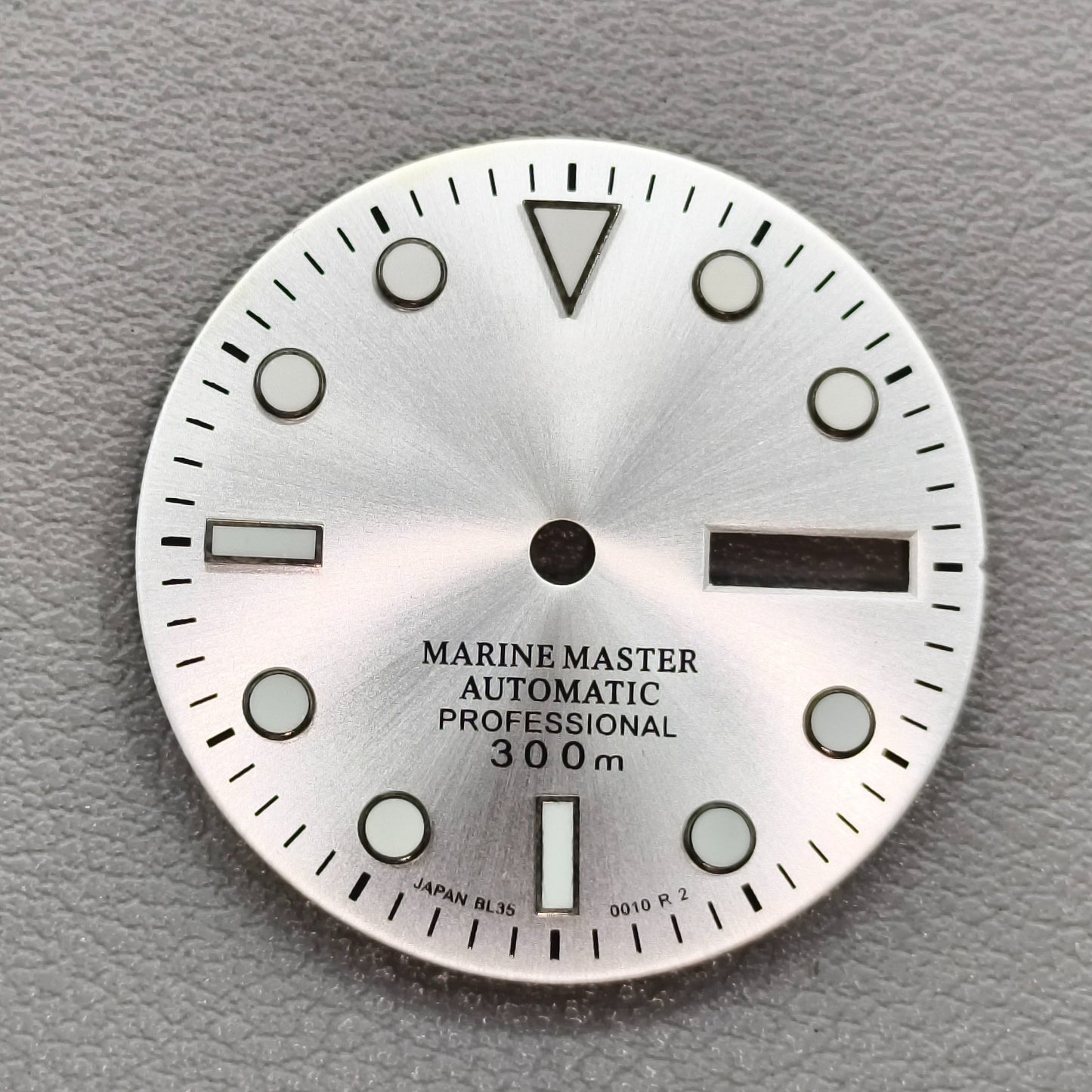watch dial with S logo