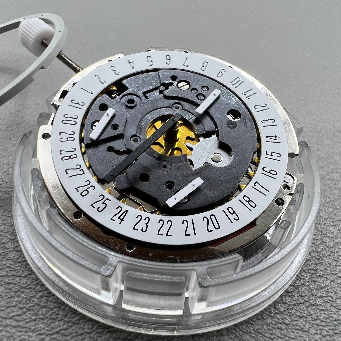 Swiss ISA 8172 Date@6 quartz watch movement replacement by ISA, precise timekeeping for watch repairs.