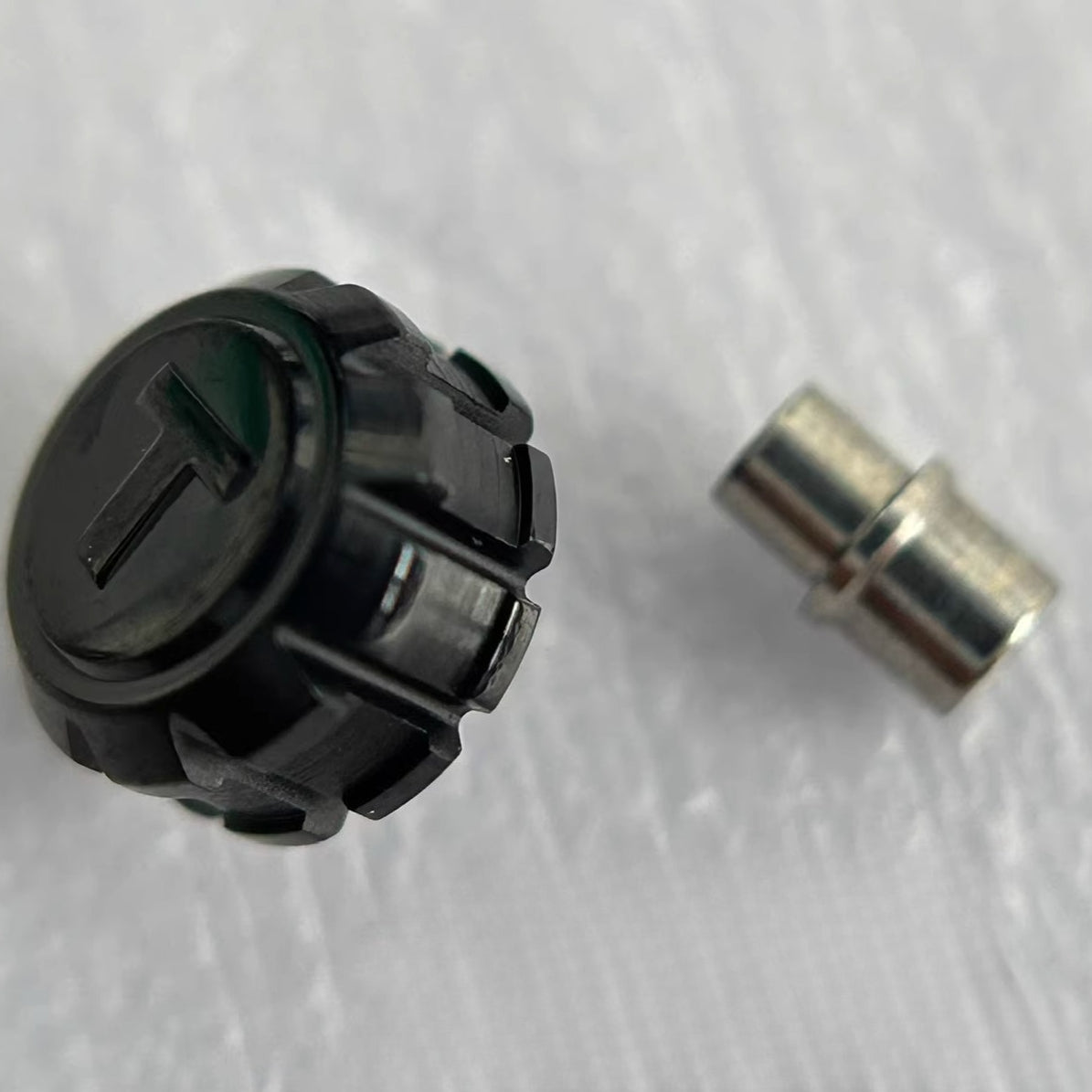 Black plated stainless steel watch crown for Tissot T055 T067, durable replacement part for repairs.
