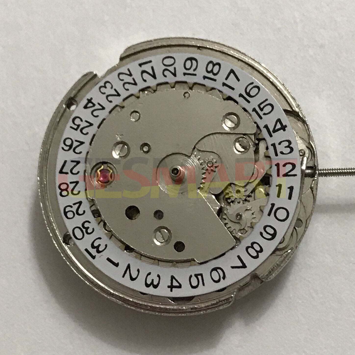 Dandong 7120 automatic watch with 3 hands and single calendar, China-made precision accessory.