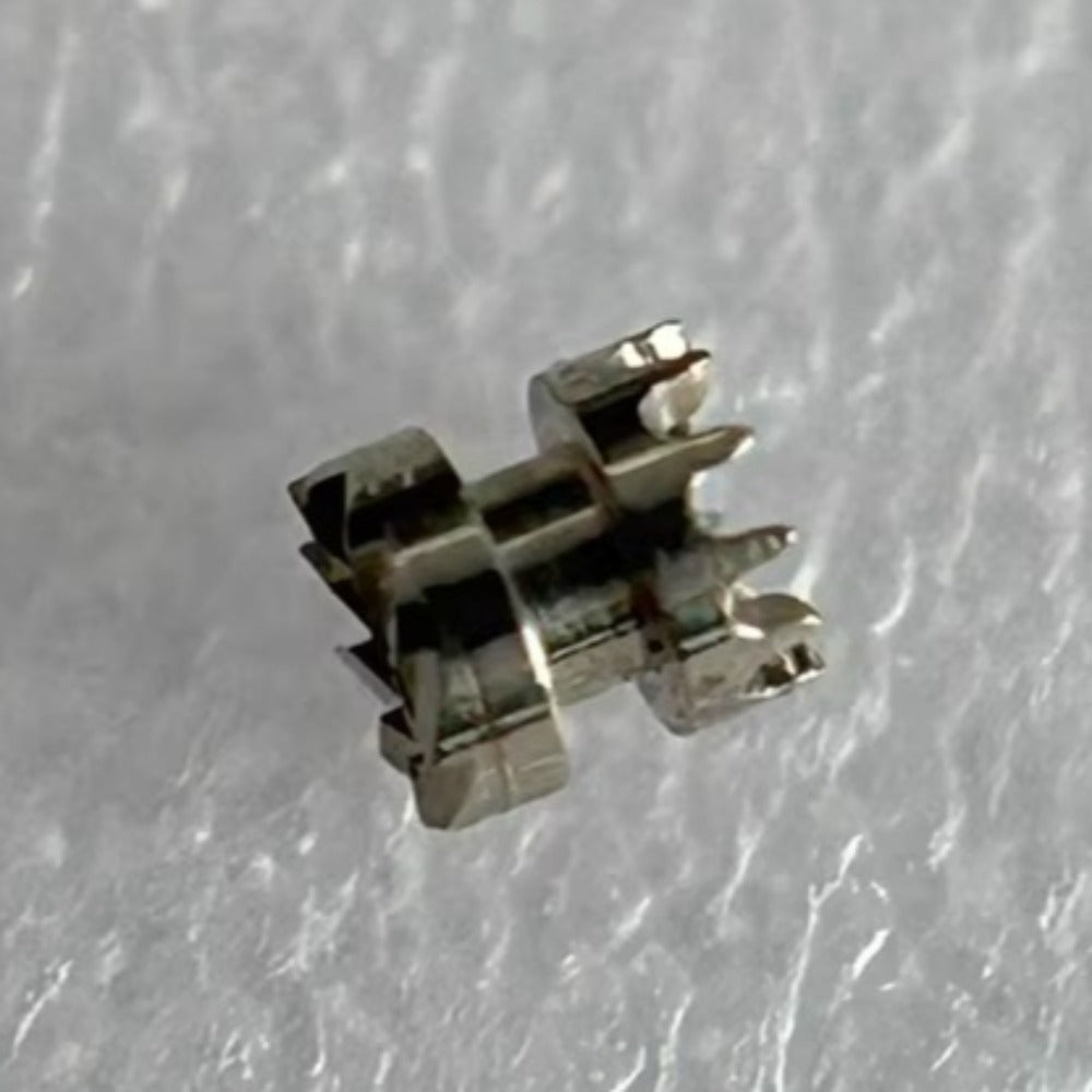 Sliding pinion clutch for Glashutte 100 watch movement, precise replacement part for timekeeping accuracy.