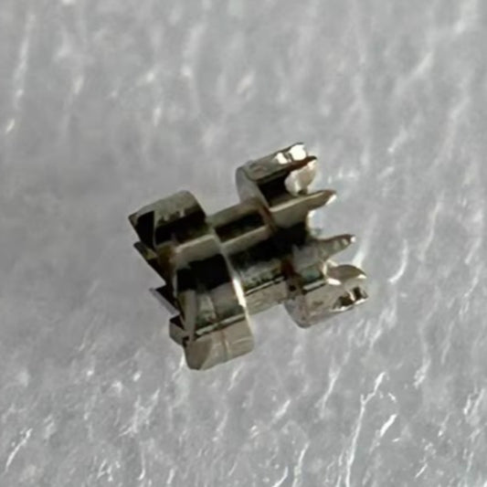 Sliding pinion clutch for Glashutte 100 watch movement, precise replacement part for timekeeping accuracy.
