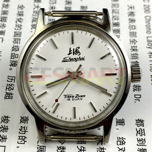 Shanghai Factory 32mm manual mechanical watch with 19 jewels, shock-resistant design for durability.