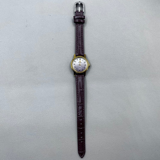 Dark Brown Strap Round Case 3 Hands Purple Background Manual Mechanical Watch