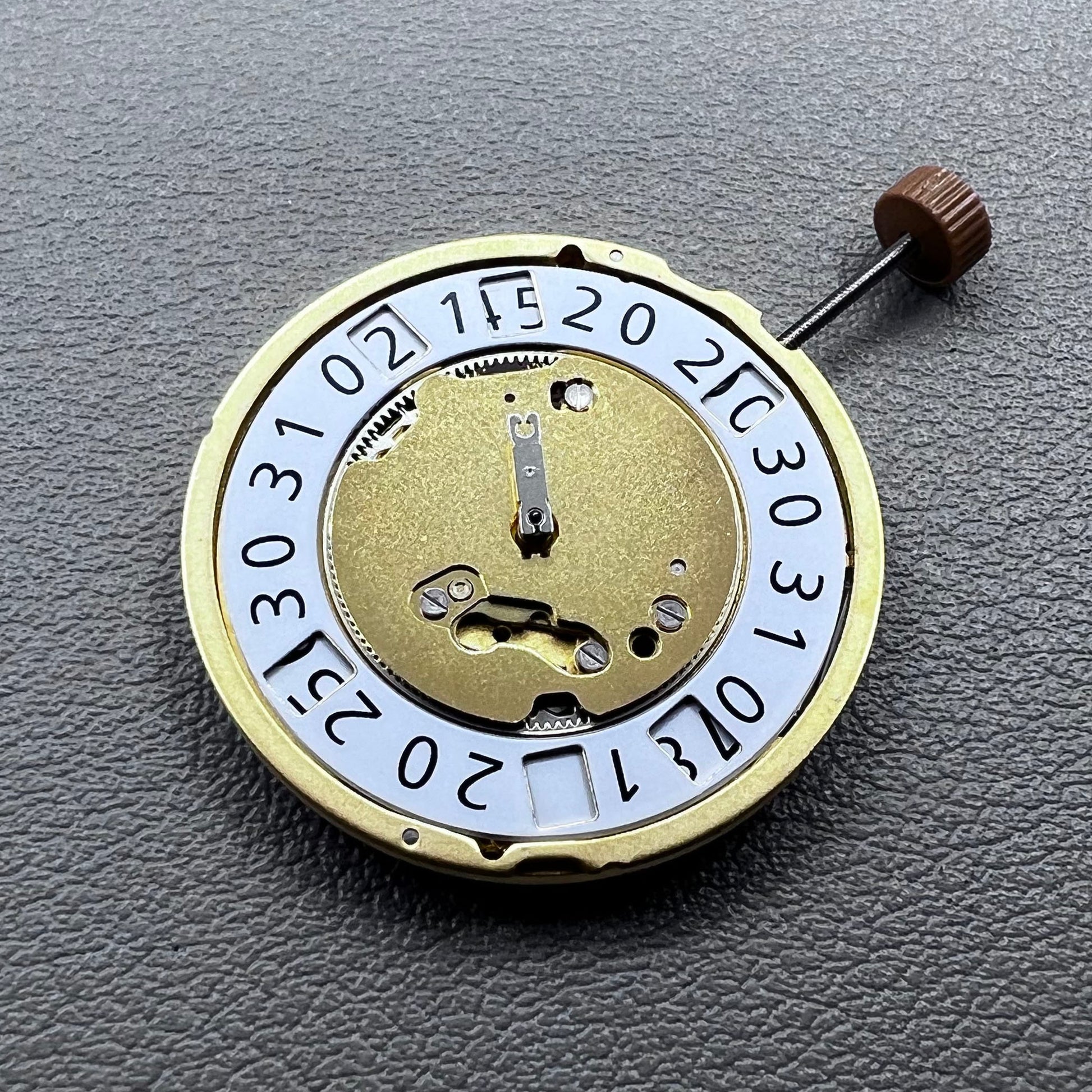 Swiss Ronda 6003B Quartz watch movement with 4 jewels and golden finish for precise timekeeping