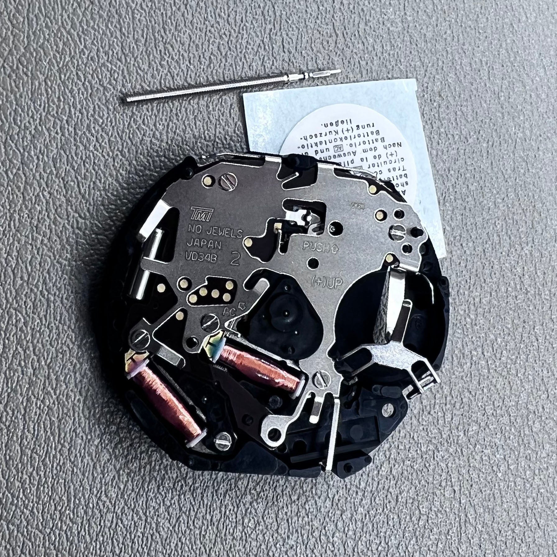 Japan Hattori Epson VD34 VD34A quartz watch movement, precise timekeeping for watch repair and assembly.