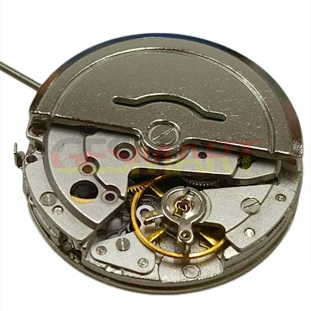 China Made 8205 automatic mechanical watch movement with small second subdials at 3, 6, and 9 o'clock positions, no calendar.