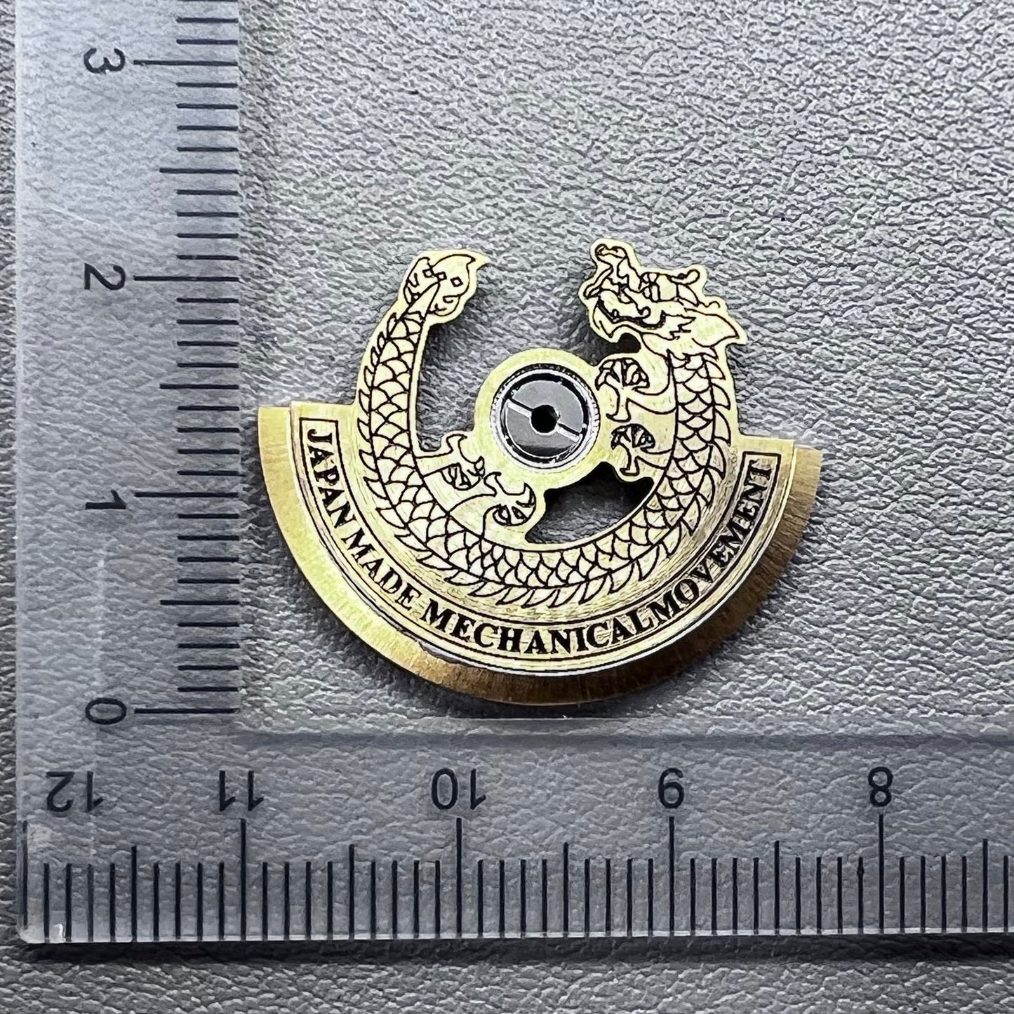 Black carved golden dragon rotor for NH35 NH36 watch movement, enhancing mechanical elegance.