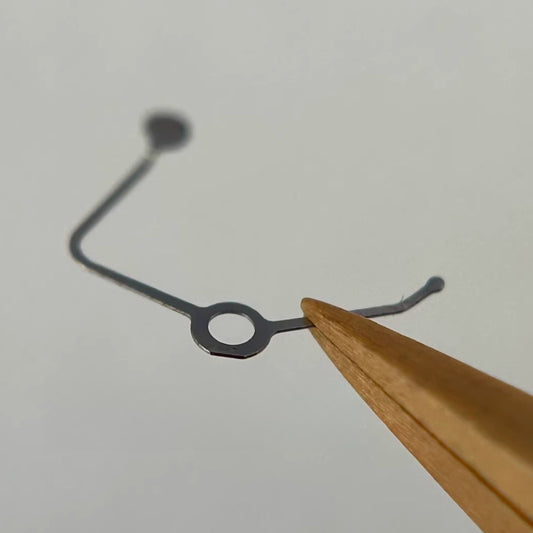 Stop lever for Swiss ETA2000 movement, precise watch part enhancing repair quality.