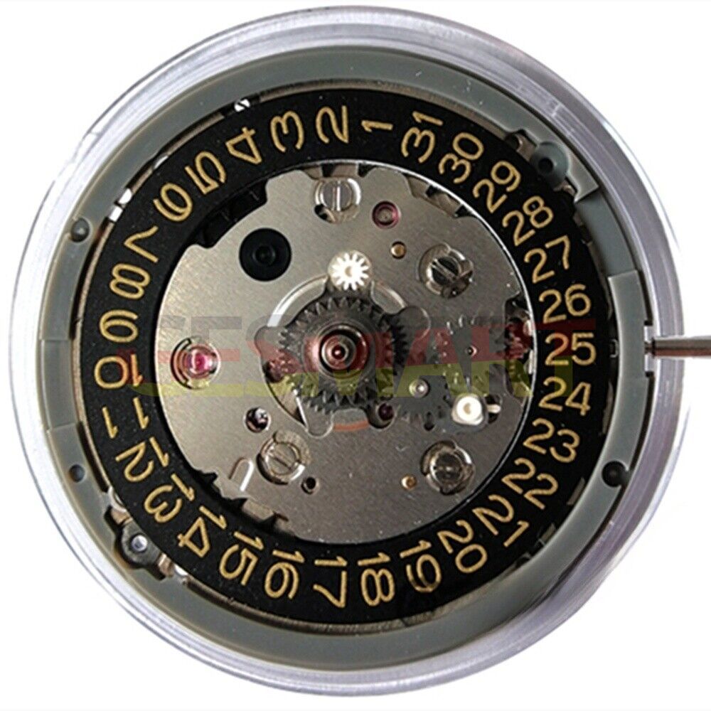 Close-up of Japan NH34 automatic GMT watch movement with golden font and black date at 3 o?clock.