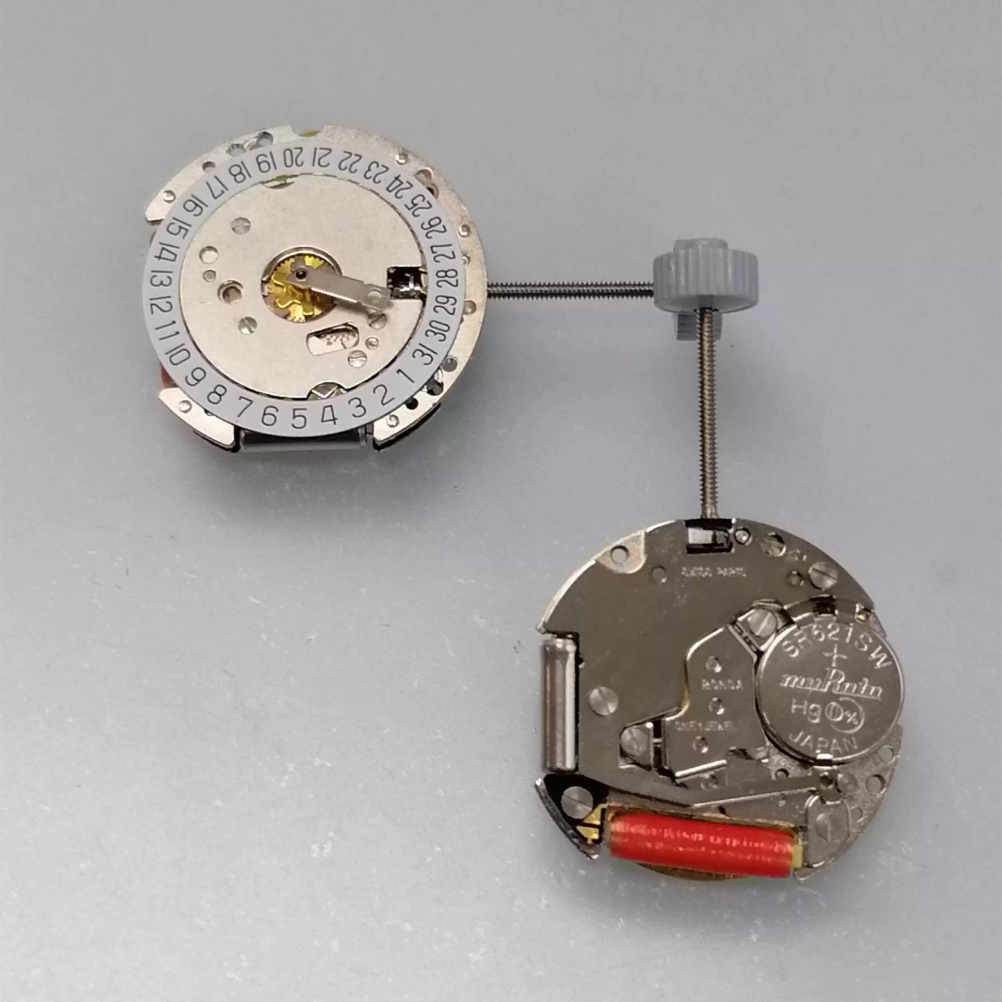 Swiss Part Ronda 775 quartz movement with white date disk at 6 o'clock for precise timekeeping.
