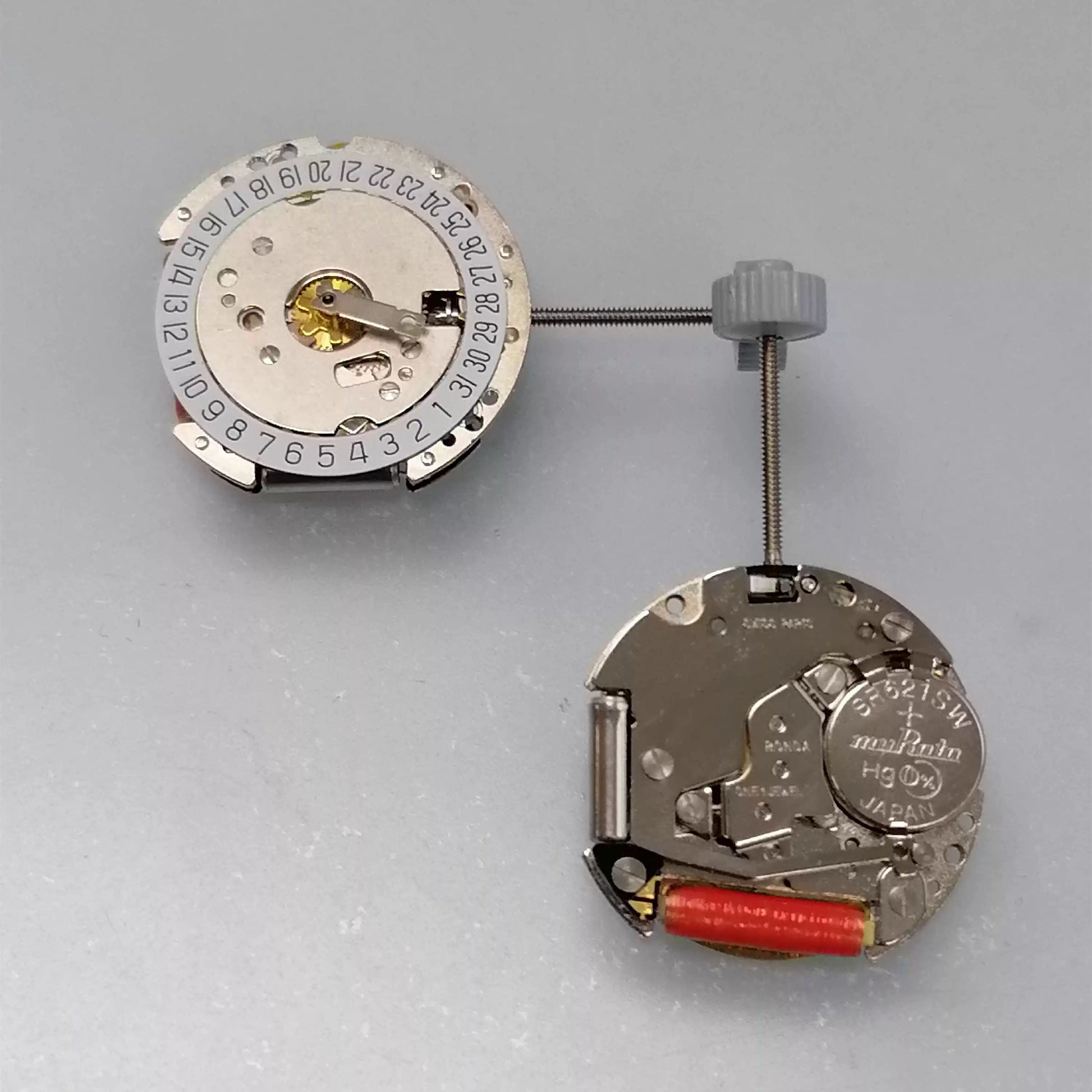 Swiss Part Ronda 775 quartz movement with white date disk at 6 o'clock for precise timekeeping.