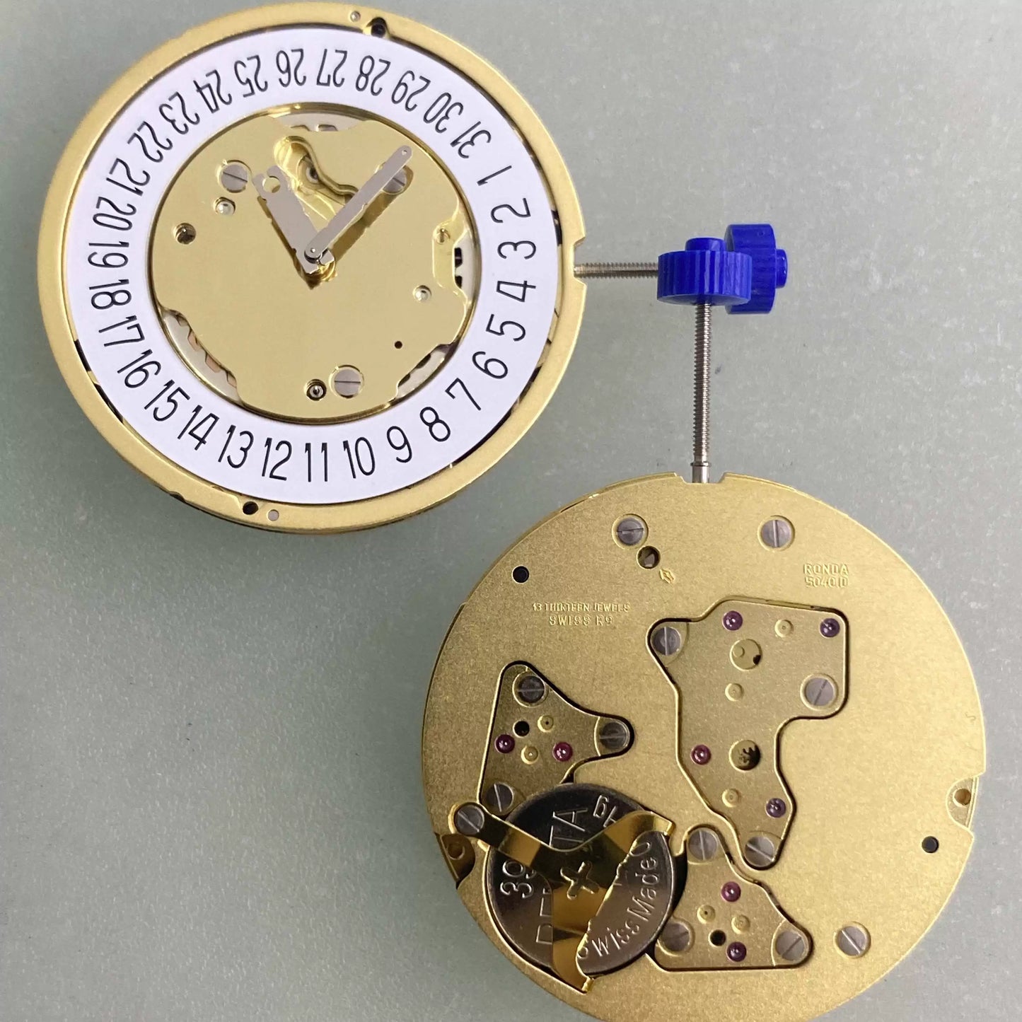 Swiss Made Ronda 5040.D quartz movement for watch repair, date display at 6 o'clock position.