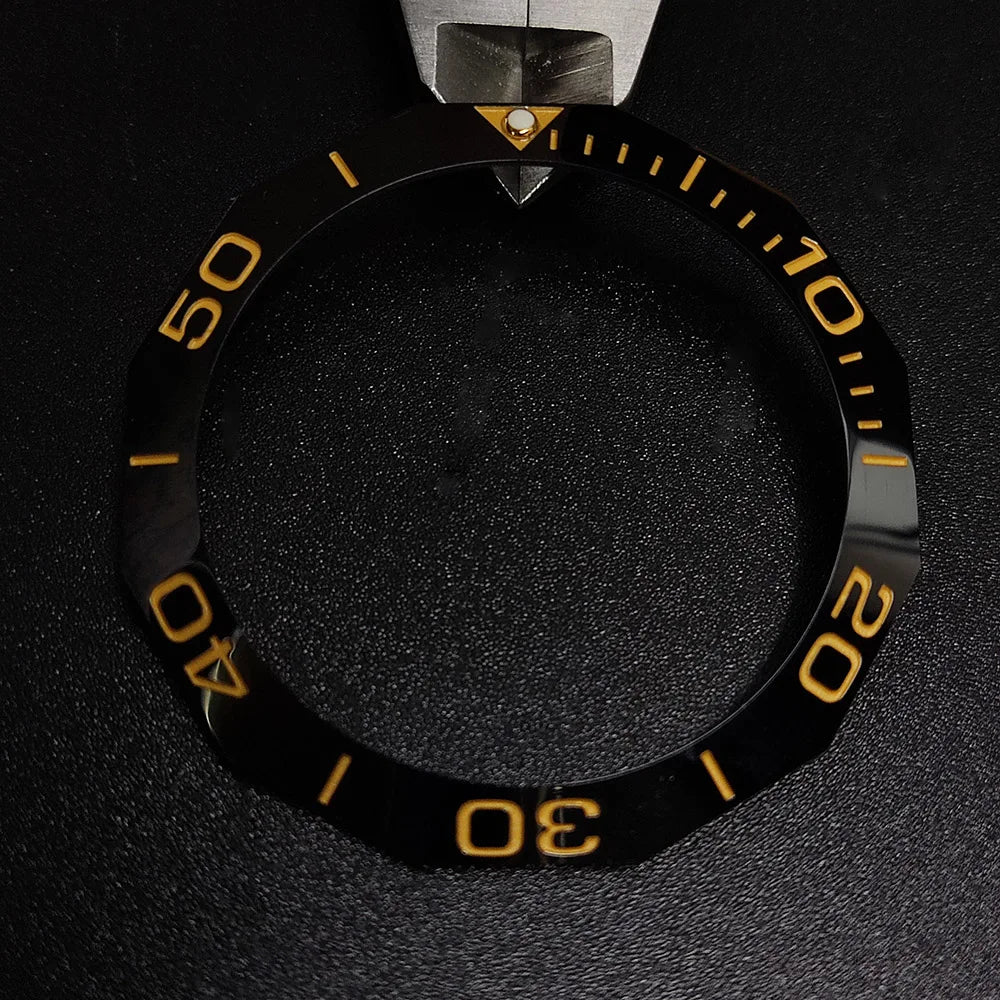 Sloping luminous ceramic bezel insert 42.3x33.3mm for automatic watch replacement, precise fit and durability.