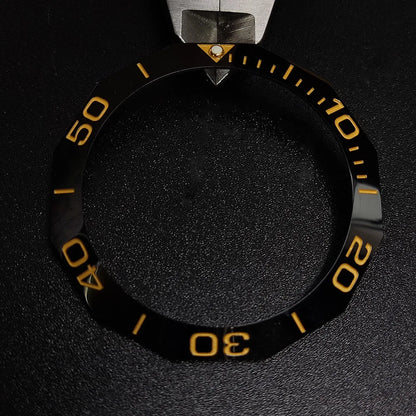 Sloping luminous ceramic bezel insert 42.3x33.3mm for automatic watch replacement, precise fit and durability.