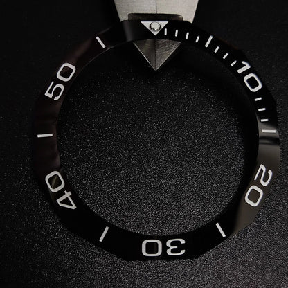 Sloping luminous ceramic bezel insert 42.3x33.3mm for automatic watch replacement, precise fit and durability.