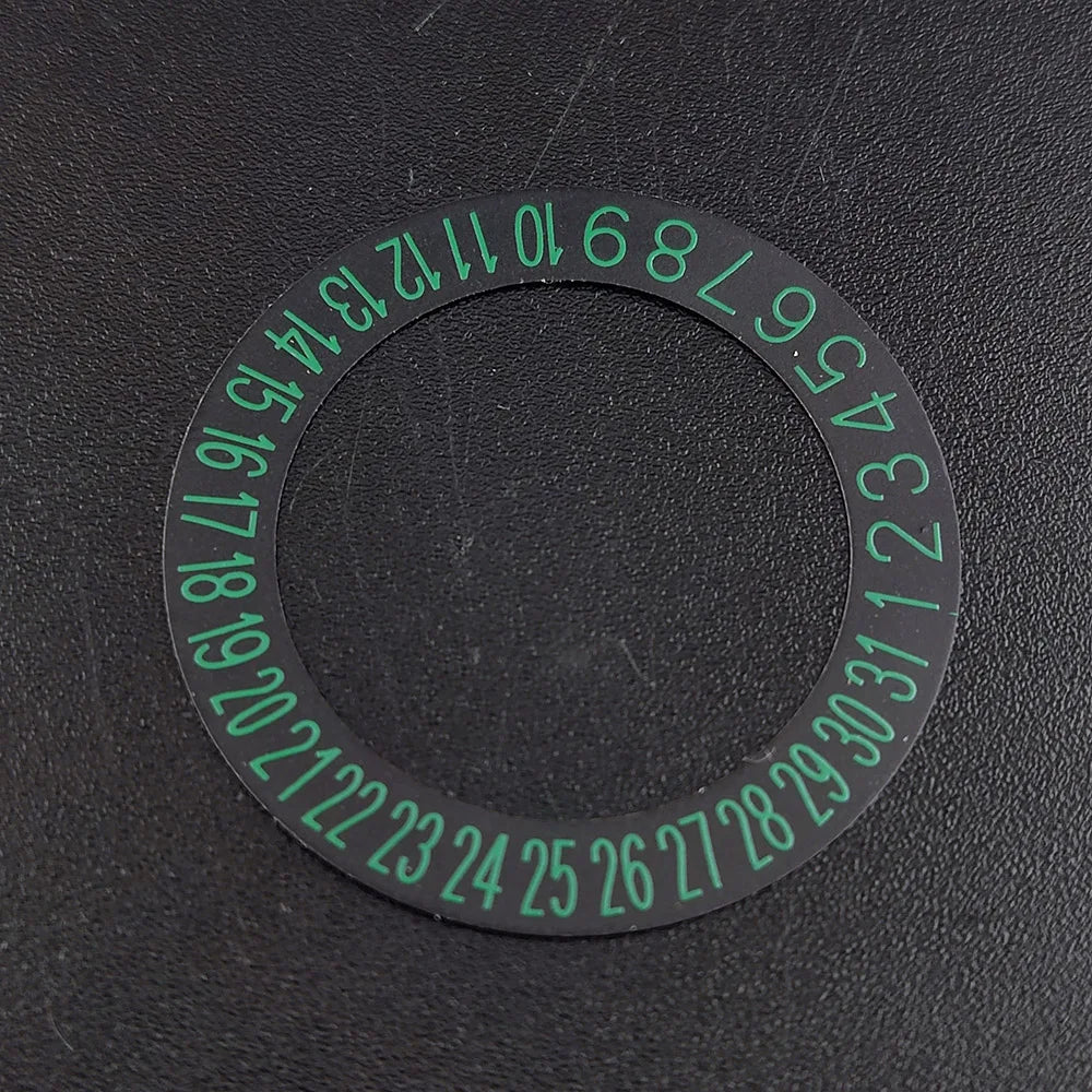 NH 35 watch calendar movement replacement parts with date and day wheel discs.