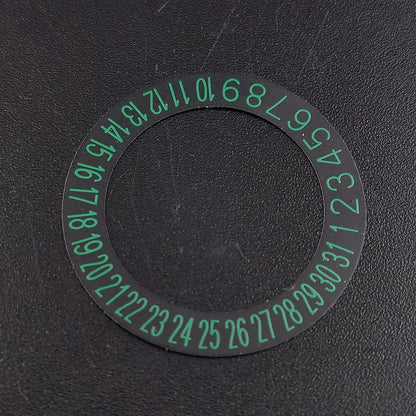 NH 35 watch calendar movement replacement parts with date and day wheel discs.