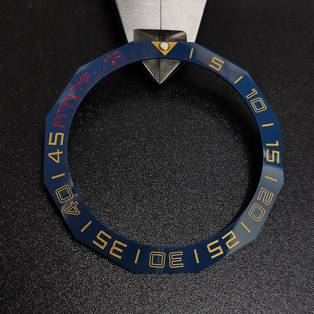 Sloping luminous ceramic bezel insert 42.3x33.3mm for automatic watch replacement, precise fit and durability.