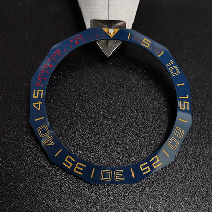 Sloping luminous ceramic bezel insert 42.3x33.3mm for automatic watch replacement, precise fit and durability.