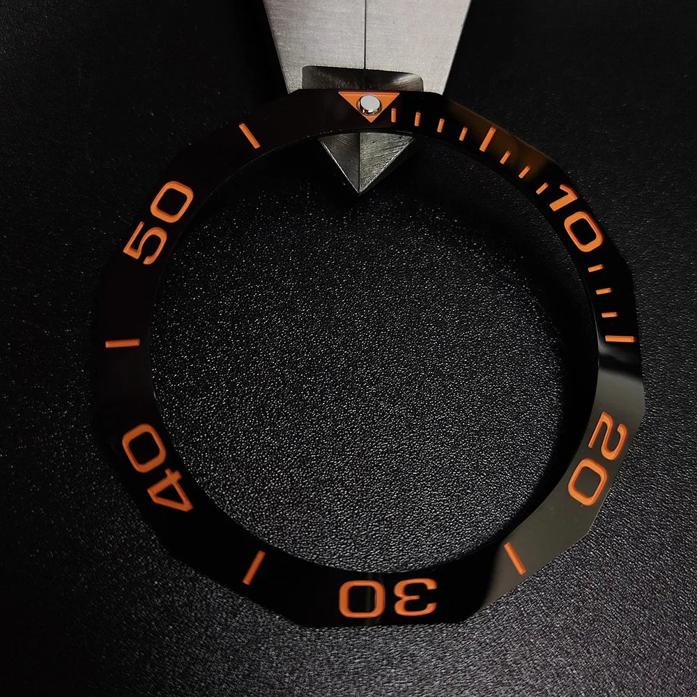 Sloping luminous ceramic bezel insert 42.3x33.3mm for automatic watch replacement, precise fit and durability.