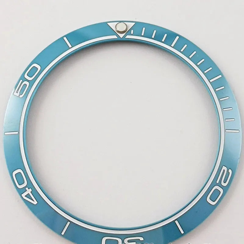 Blue ceramic bezel insert with white Arabic numerals for SUB GMT 38mm diver watch.