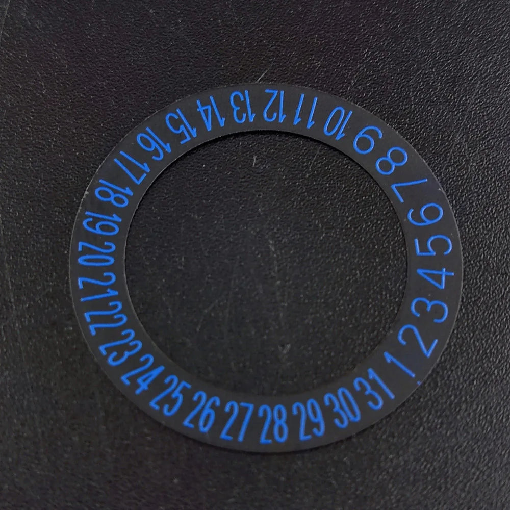 NH 35 watch calendar movement replacement parts with date and day wheel discs.
