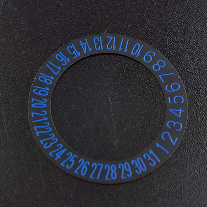 NH 35 watch calendar movement replacement parts with date and day wheel discs.