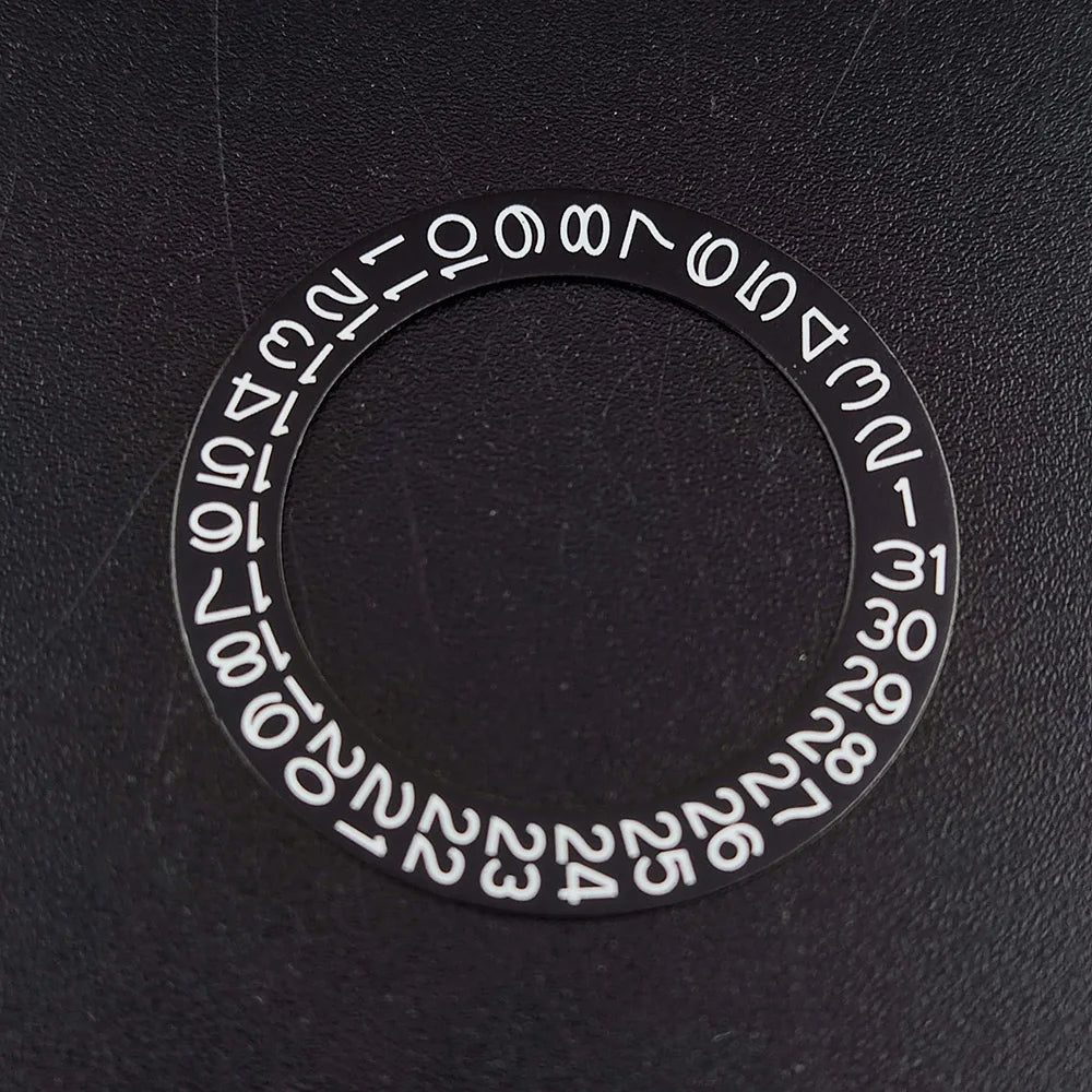 NH 35 watch calendar movement replacement parts with date and day wheel discs.