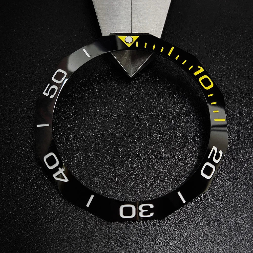 Sloping luminous ceramic bezel insert 42.3x33.3mm for automatic watch replacement, precise fit and durability.