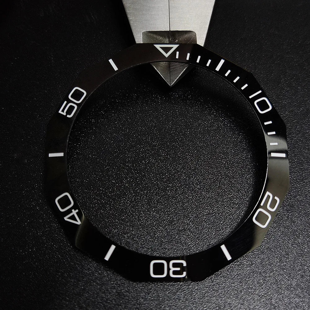 Sloping luminous ceramic bezel insert 42.3x33.3mm for automatic watch replacement, precise fit and durability.