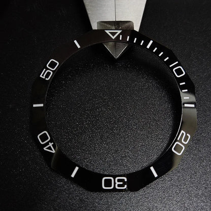 Sloping luminous ceramic bezel insert 42.3x33.3mm for automatic watch replacement, precise fit and durability.