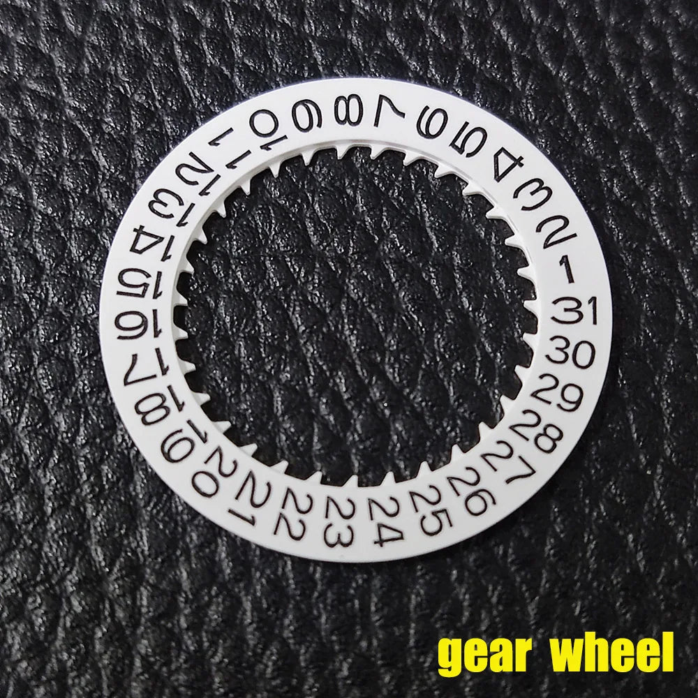 NH 35 watch calendar movement replacement parts with date and day wheel discs.