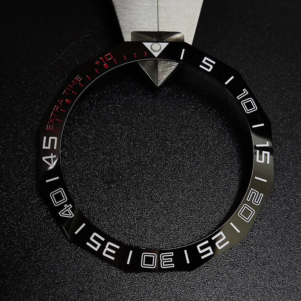 Sloping luminous ceramic bezel insert 42.3x33.3mm for automatic watch replacement, precise fit and durability.