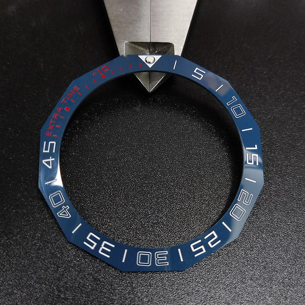 Sloping luminous ceramic bezel insert 42.3x33.3mm for automatic watch replacement, precise fit and durability.