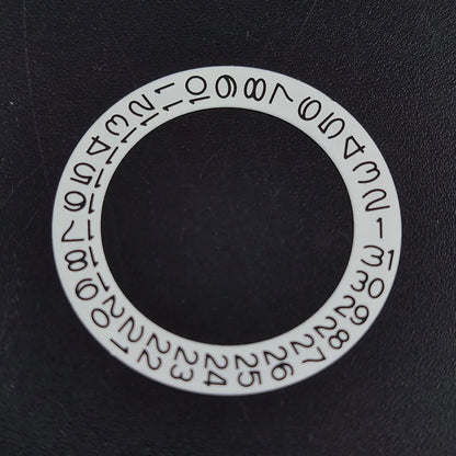 NH 35 watch calendar movement replacement parts with date and day wheel discs.