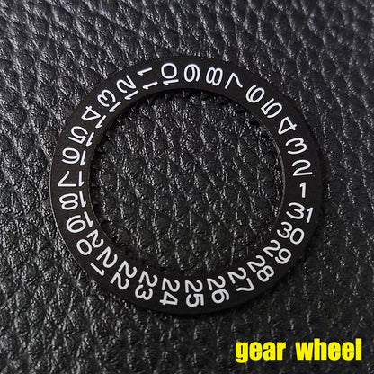 NH 35 watch calendar movement replacement parts with date and day wheel discs.