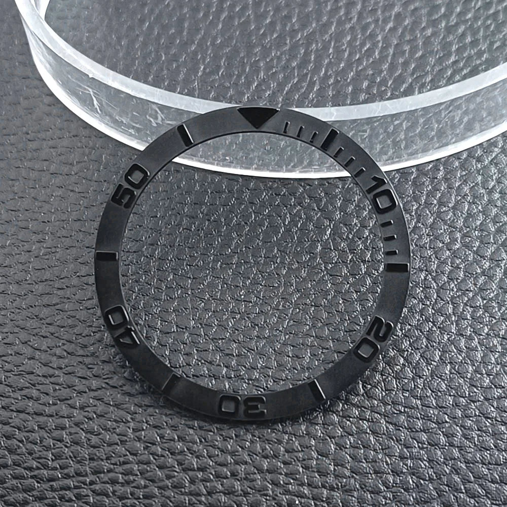 Flat ceramic bezel insert 38mm with luminous markers for precise watch accessory replacement.