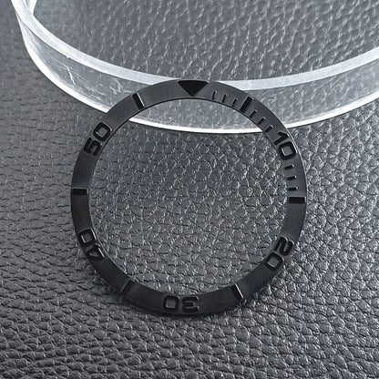 Flat ceramic bezel insert 38mm with luminous markers for precise watch accessory replacement.