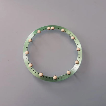 NH70 Movement skeleton dial with green luminous markers and chapter ring, 28.5x24.5mm for watch accessories.